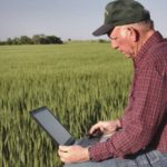 Farmer and laptop