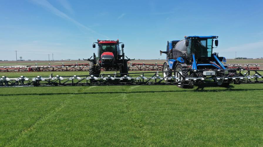 CNH Industrial brands Case IH (left) and New Holland (right) sprayers equipped with One Smart Spray technology