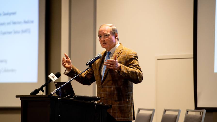 MSU President Mark E. Keenum speaks during the opening of the 4th Annual AI in Agriculture and Natural Resources Conference this week. (Photo by Emily Grace McCall)